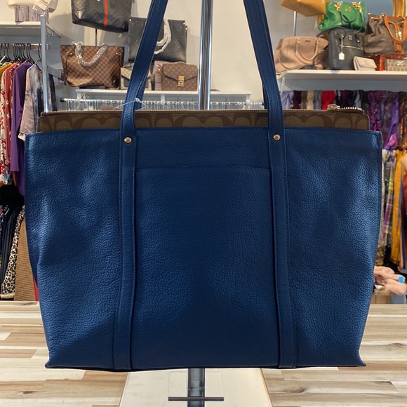 Blue leather Coach tote with brown signature strip on top. - Picture 3 of 7
